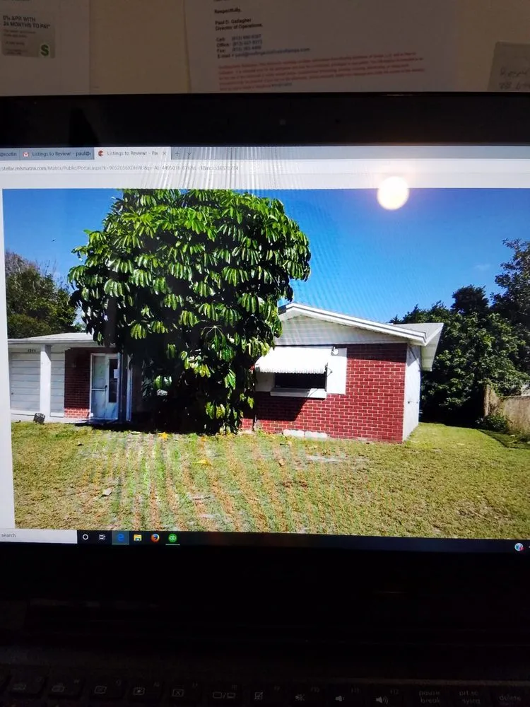 Slide of Roofing Solutions of Tampa