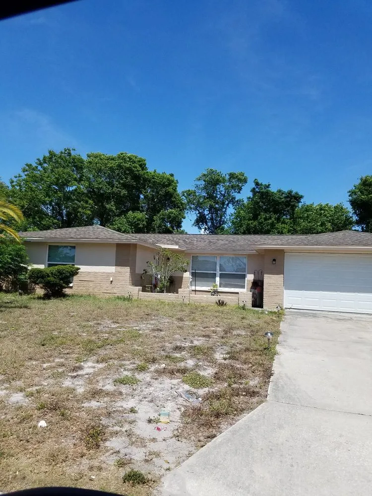 Slide of Roofing Solutions of Tampa