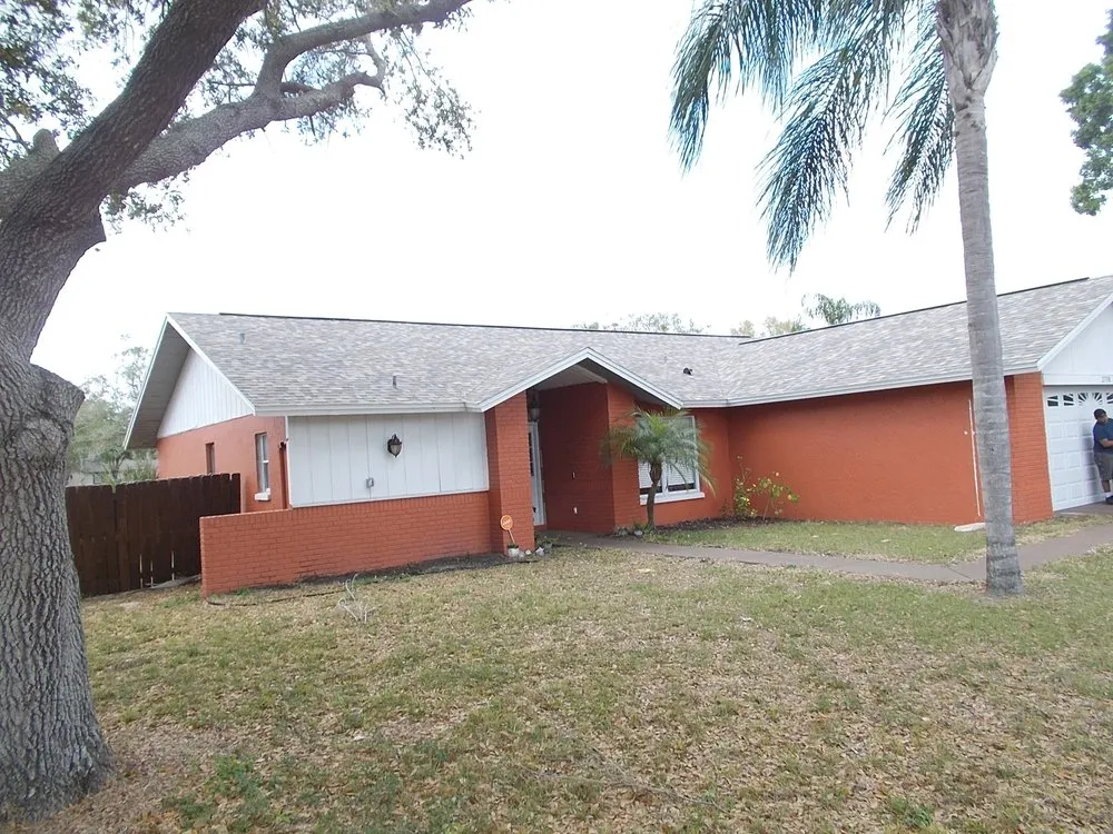 Slide of Roofing Solutions of Tampa