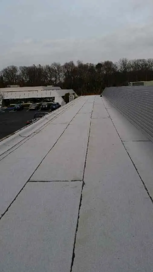 Slide of Roofing Specialists Corp