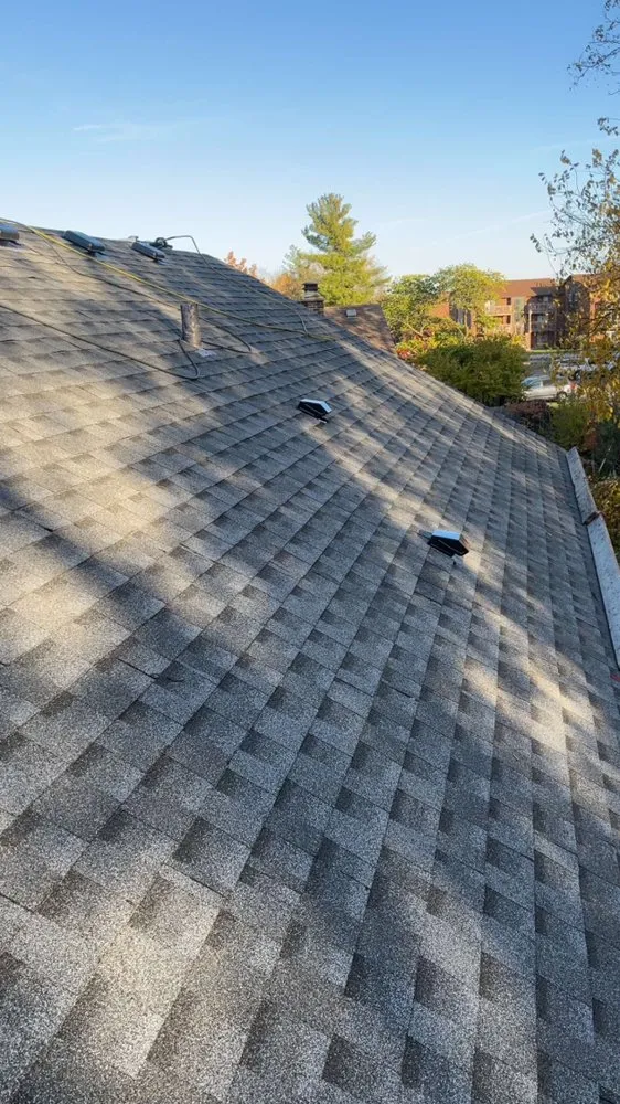 Slide of Roofing Technicians