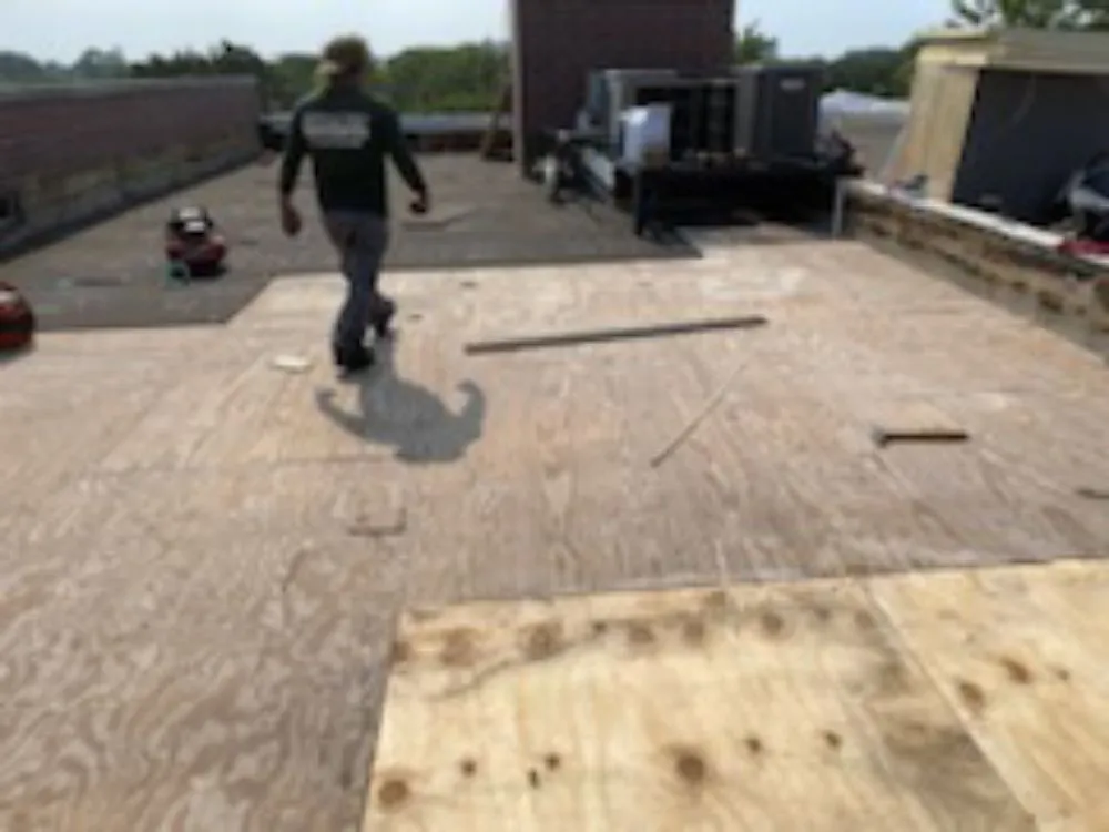 Slide of Roofing Techs
