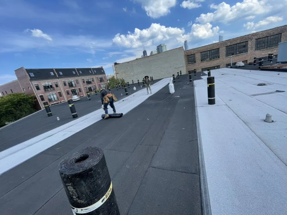 Slide of Roofing Techs