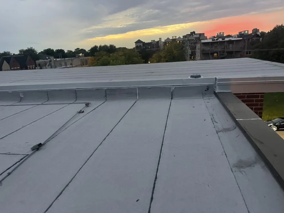Slide of Roofing Techs