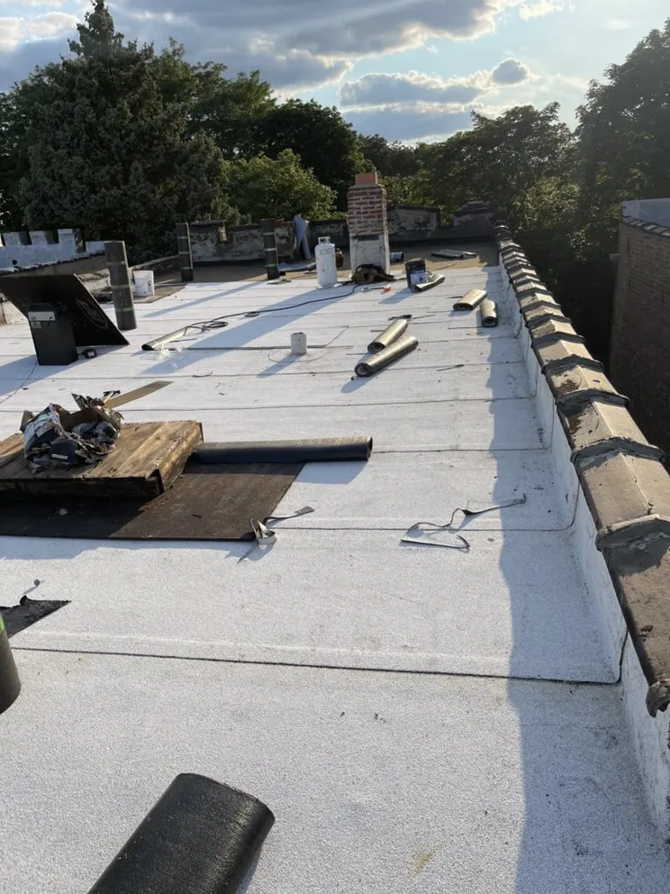 Slide of Roofing Techs