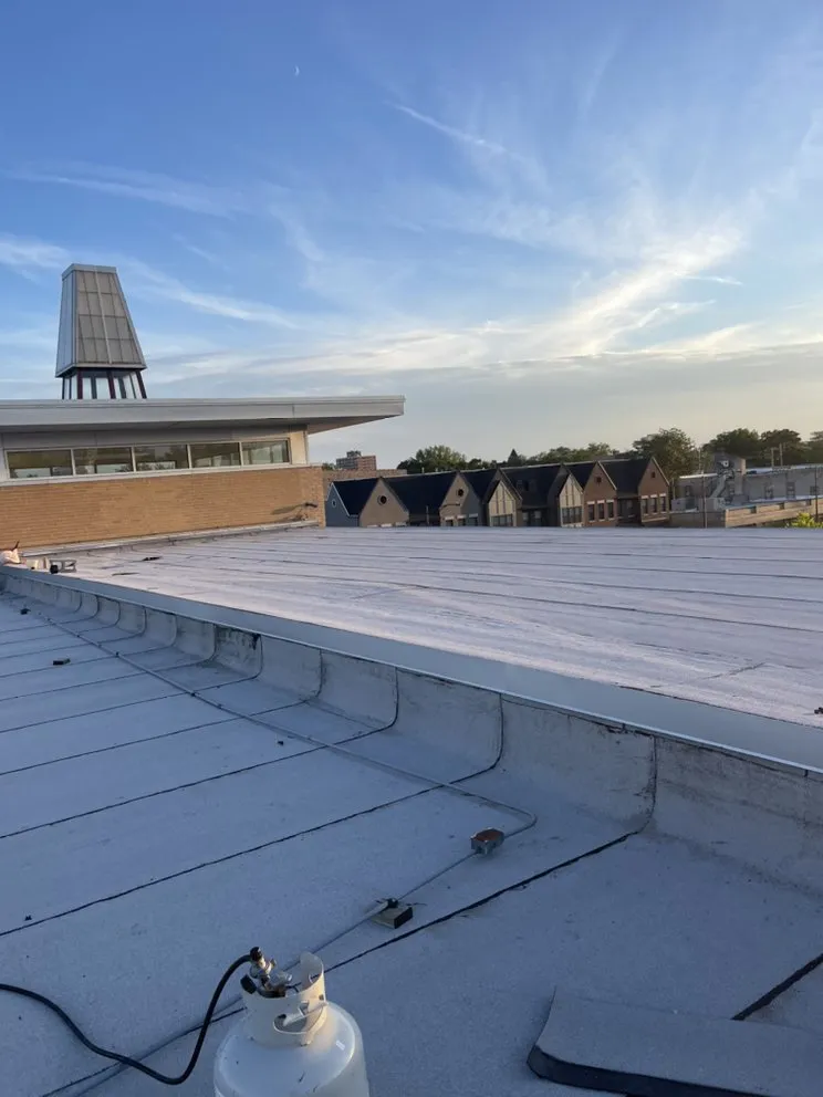 Slide of Roofing Techs