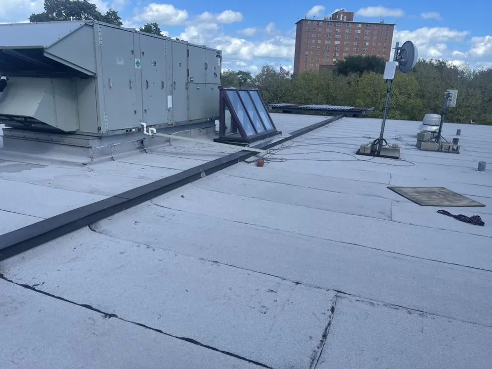 Slide of Roofing Techs