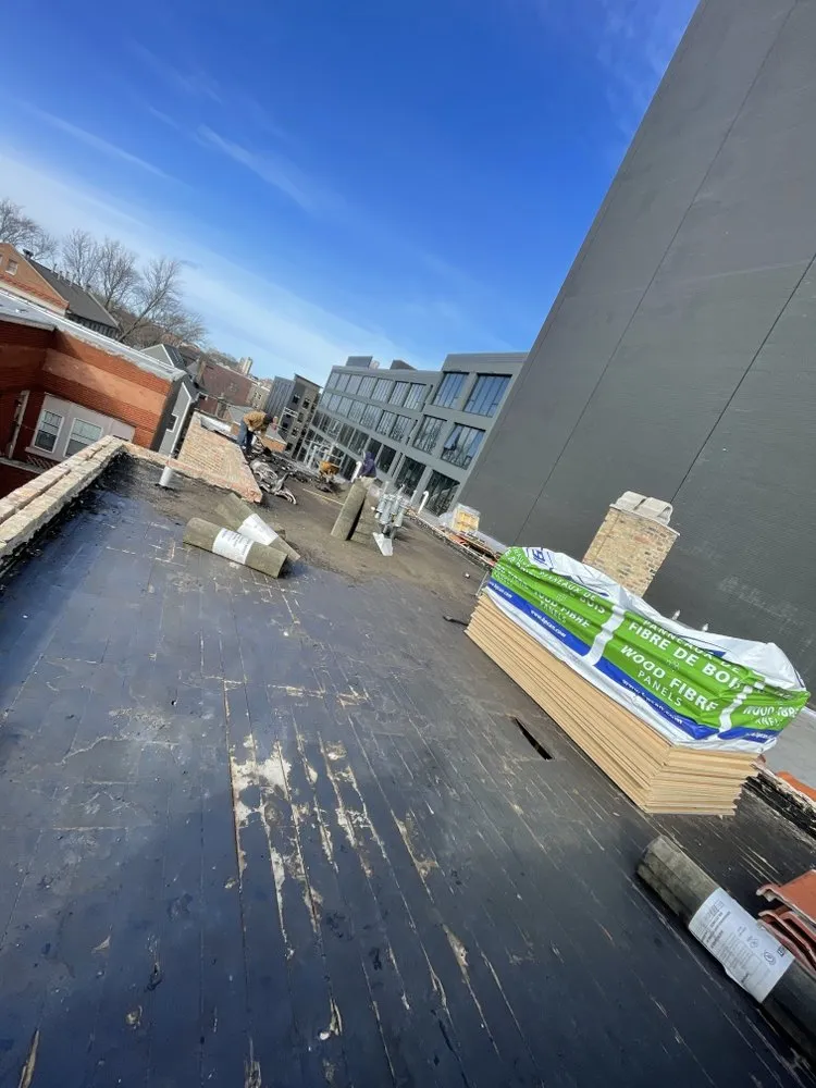 Slide of Roofing Techs