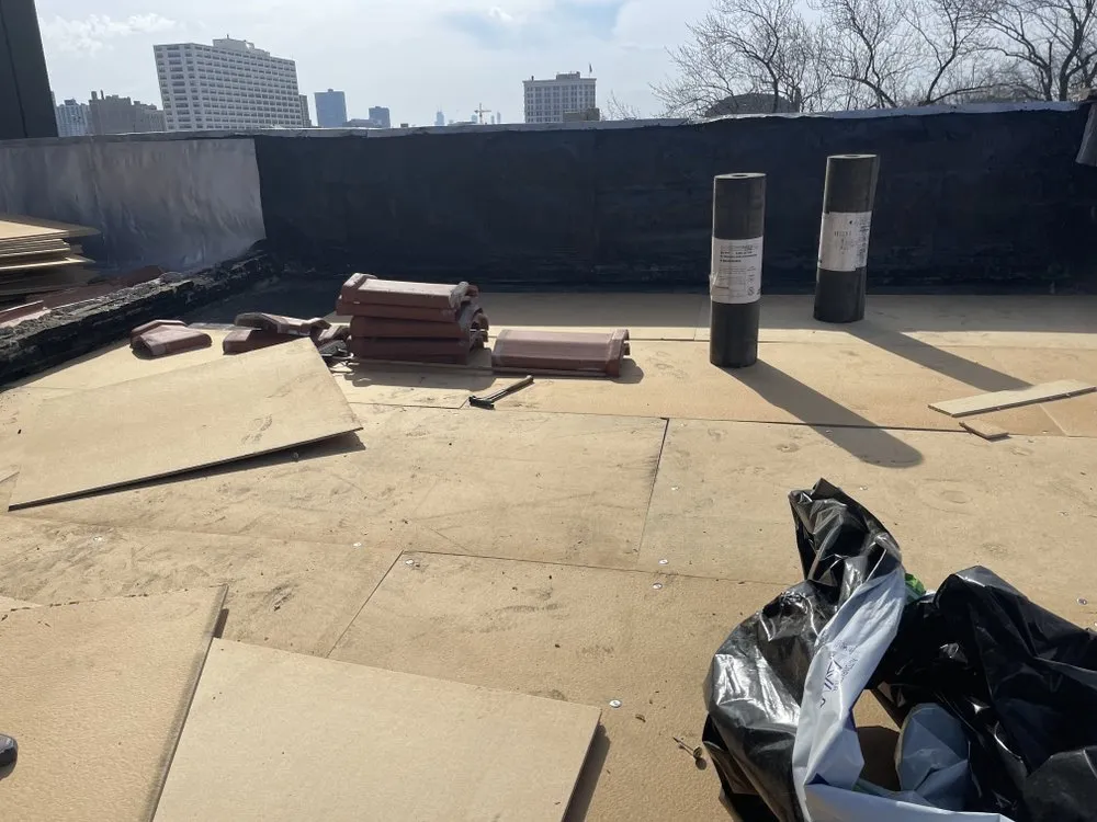 Slide of Roofing Techs