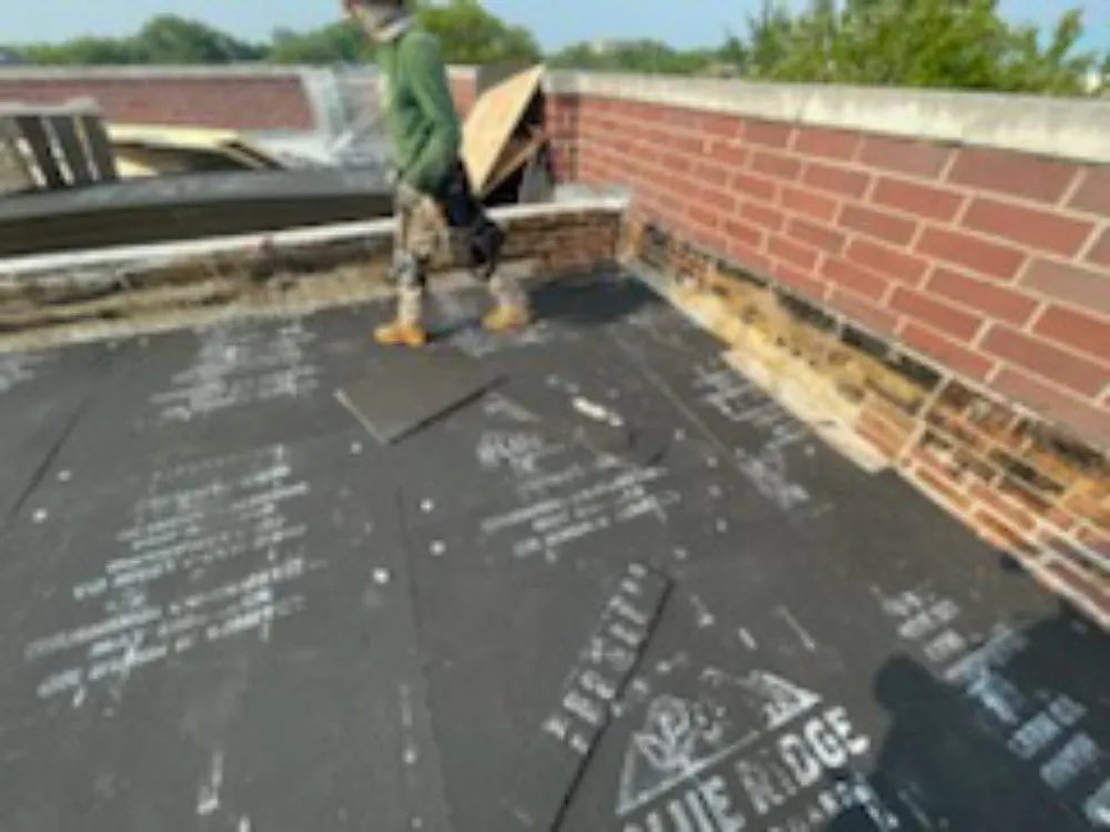 Slide of Roofing Techs