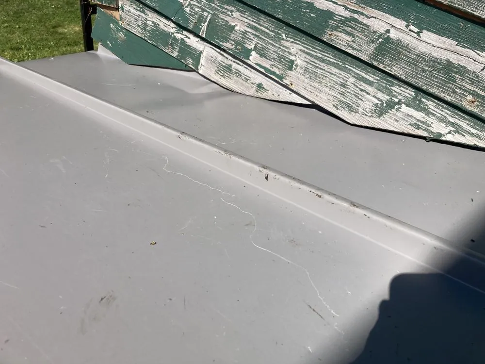 Slide of Roofing Vermont