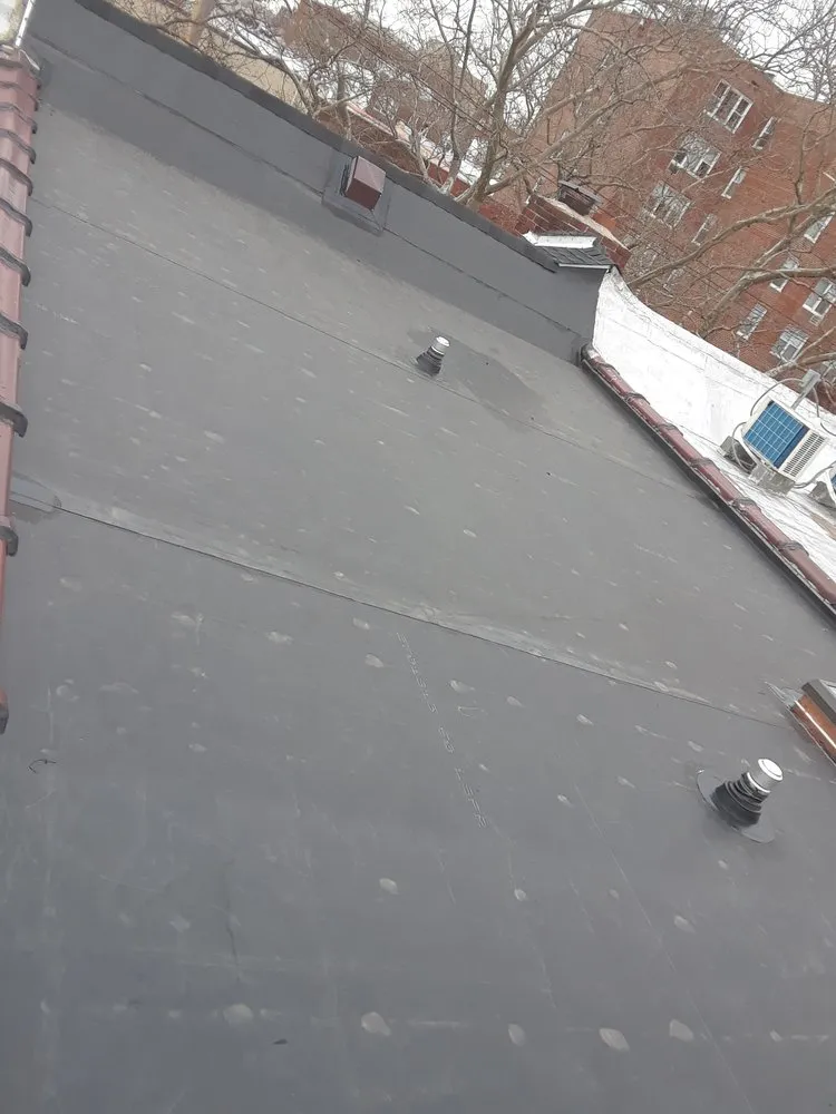 Slide of Roofing World Of NY