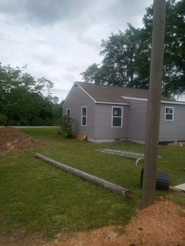 Slide of Roofing Worx