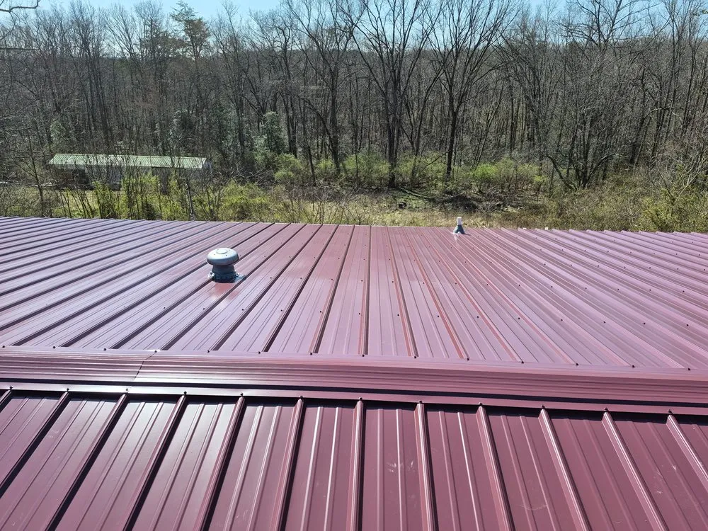Reliable metal roofing installation with free inspection in Crawford, TN by Roofline Builders LLC