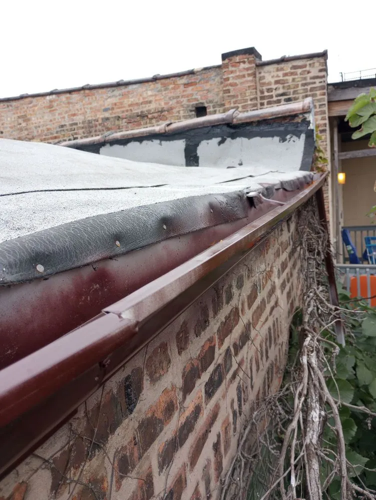 Slide of Roofmasters and Masonry