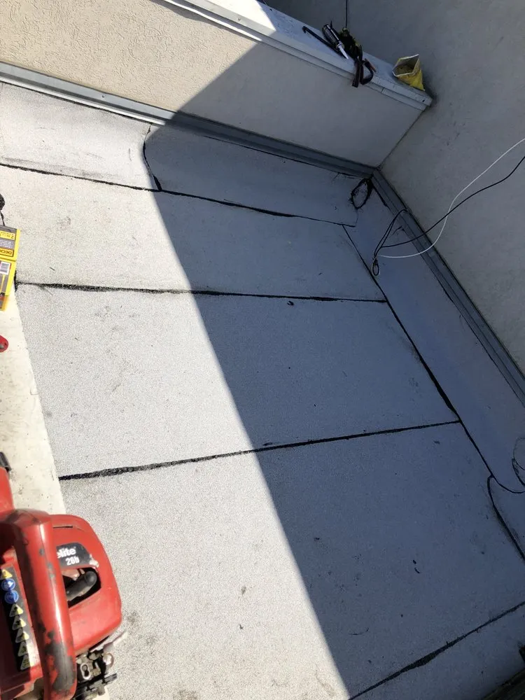 Slide of Roofmen & Maintenance