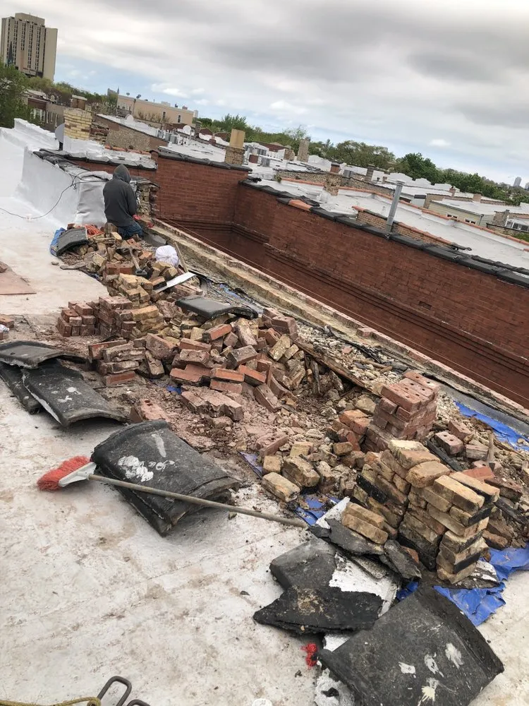 Slide of Roofmen & Maintenance