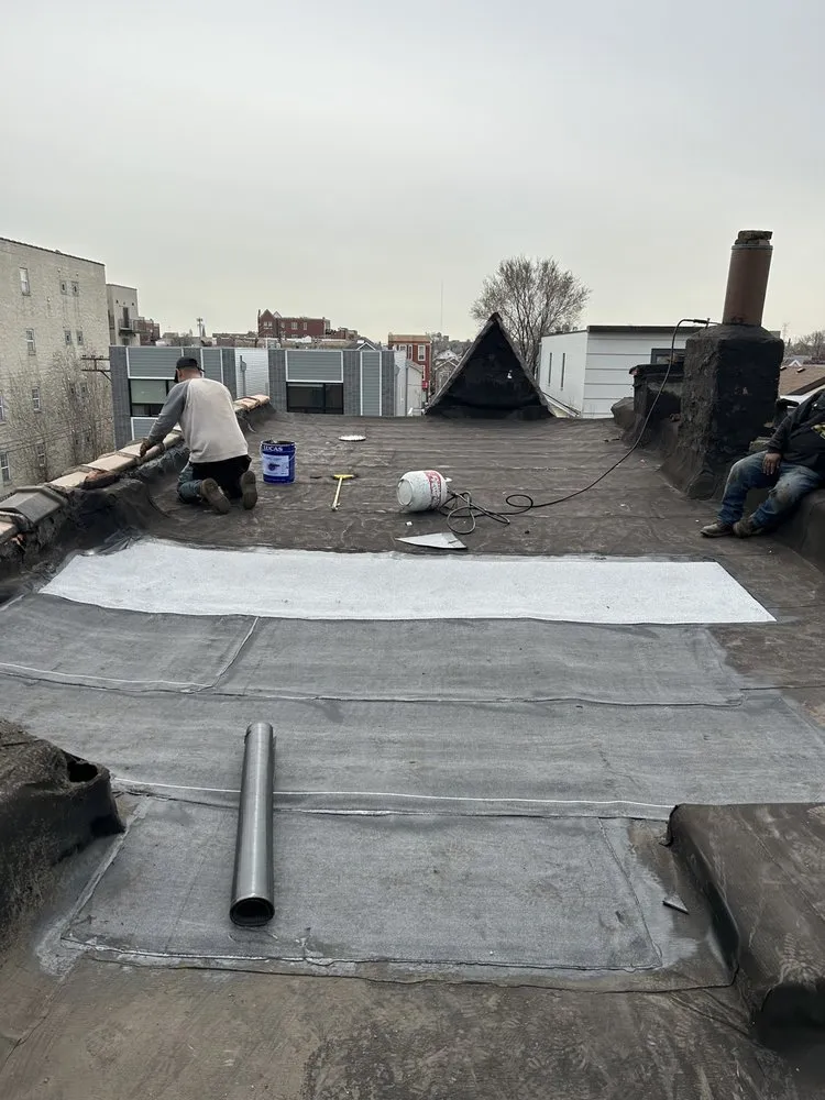 Slide of Roofmen & Maintenance