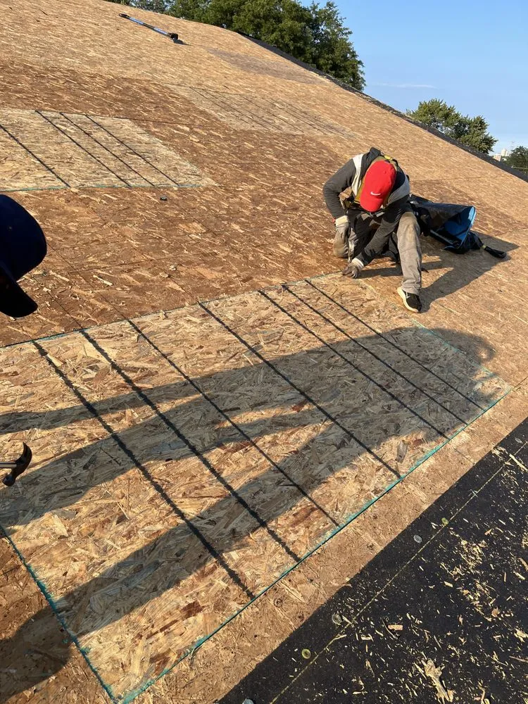 Slide of Roofmen & Maintenance