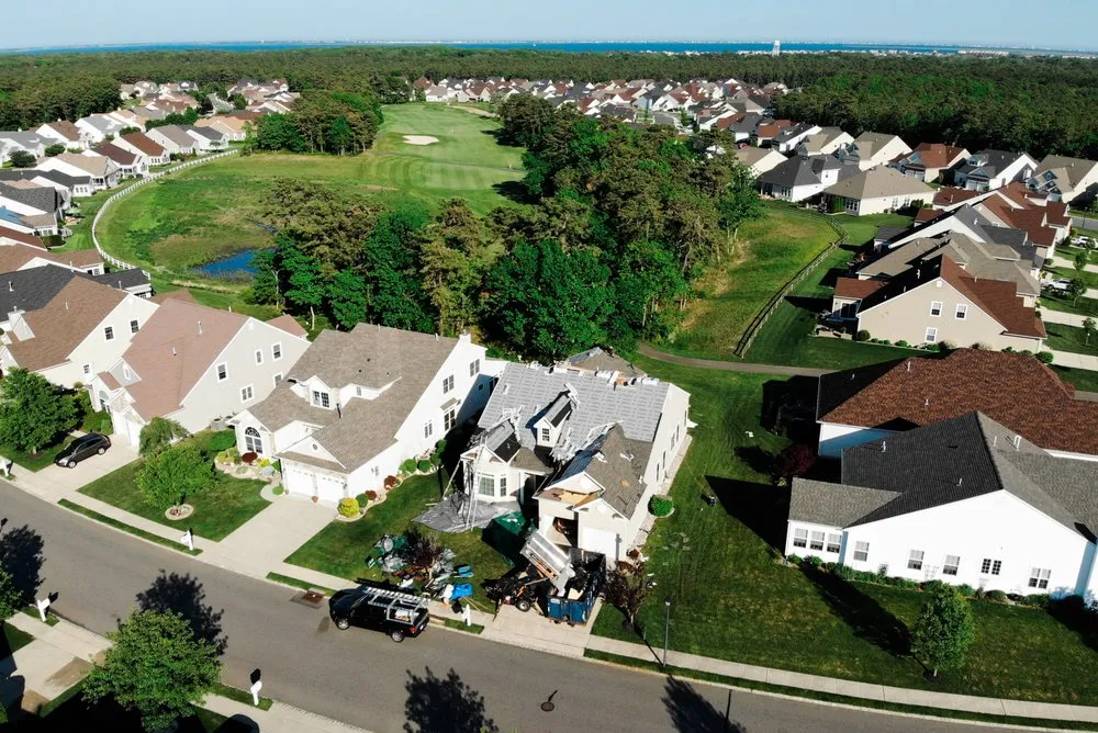 Expert storm damage roof repair after storm damage across Washington Crossing, PA - Roofs by Tip Top