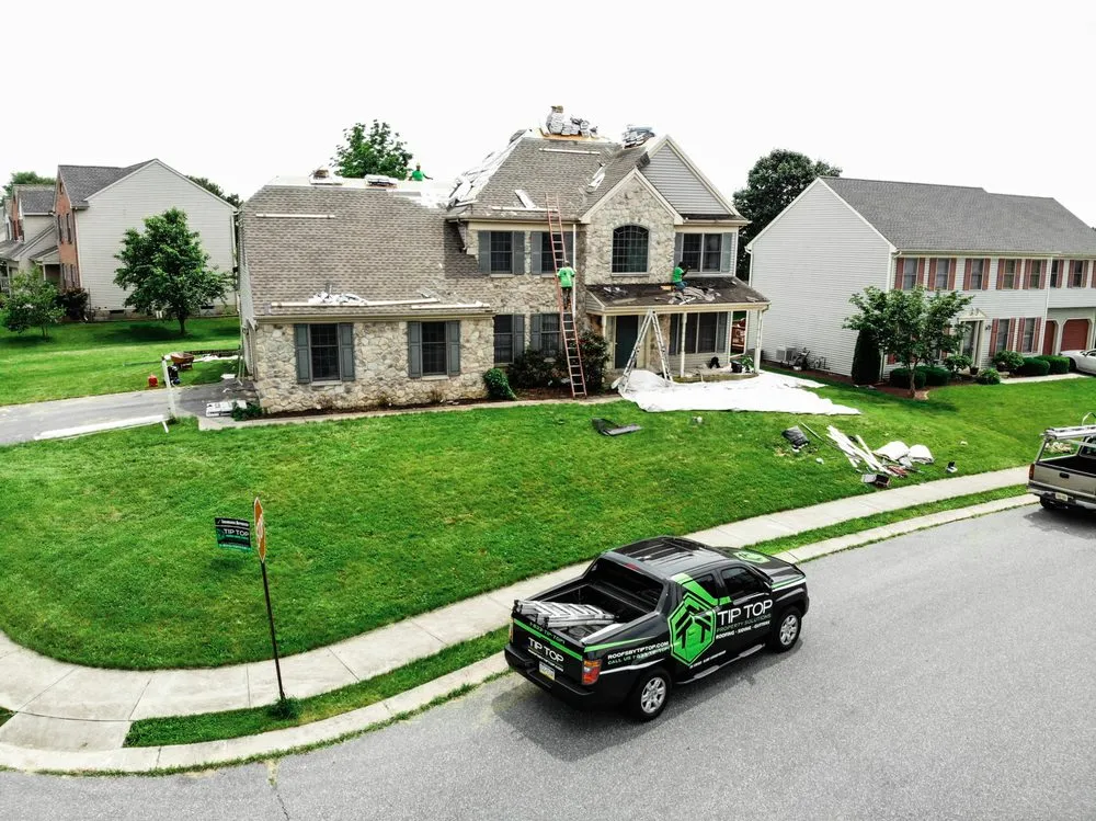 Licensed flat roof repair experts serving Washington Crossing, PA - Roofs by Tip Top