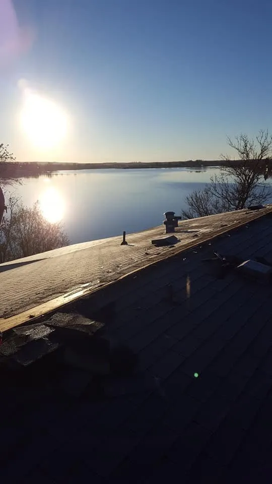 Slide of Rooftop -Your Roofing Contractor- Renovation & Exteriors