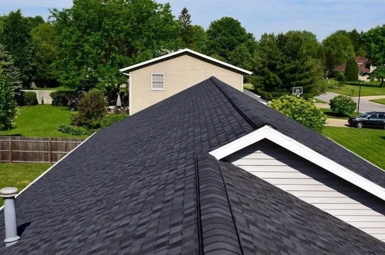 Slide of Rooftop -Your Roofing Contractor- Renovation & Exteriors