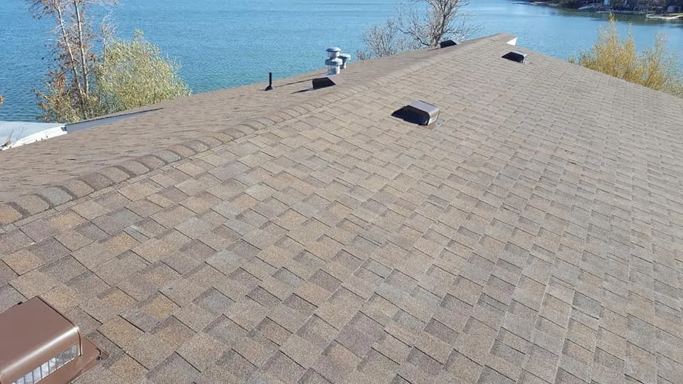 Slide of Rooftop -Your Roofing Contractor- Renovation & Exteriors
