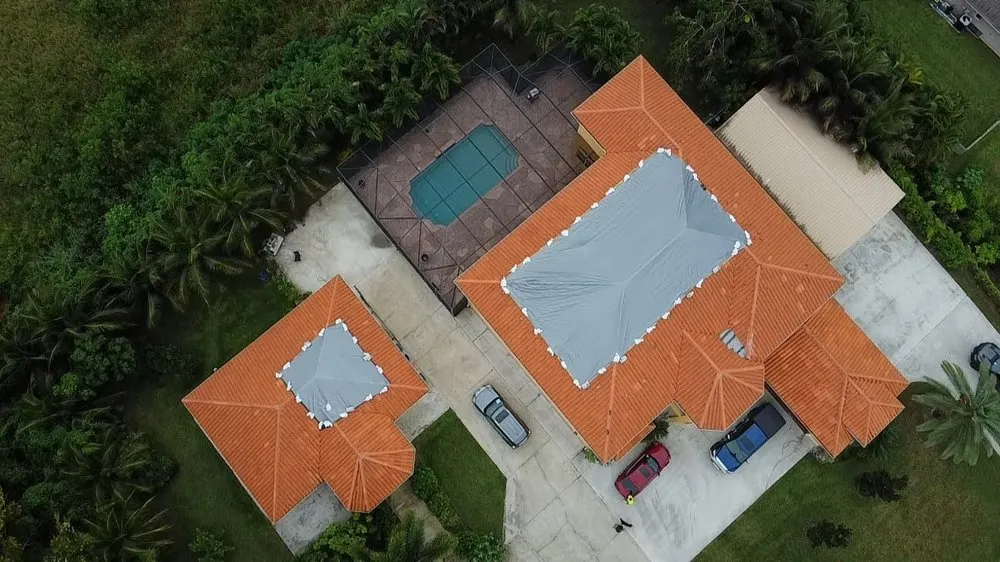 Slide of RoofTop Tarping