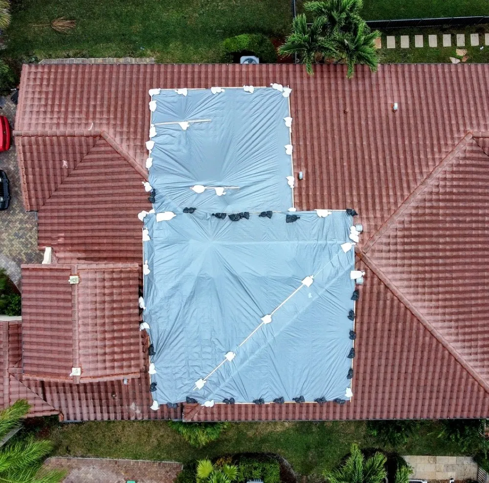 Slide of RoofTop Tarping