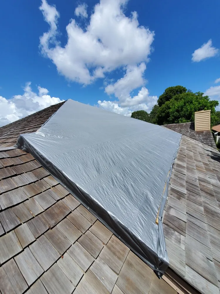 Slide of RoofTop Tarping