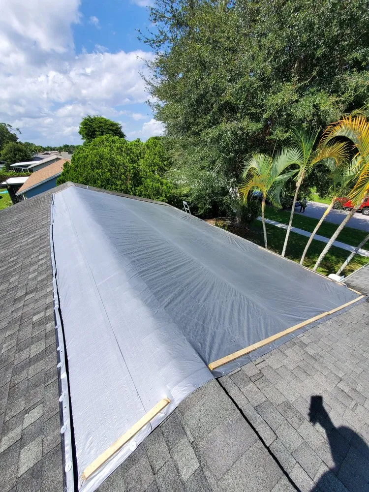 Slide of RoofTop Tarping