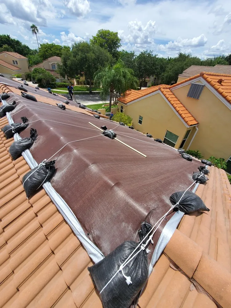 Slide of RoofTop Tarping