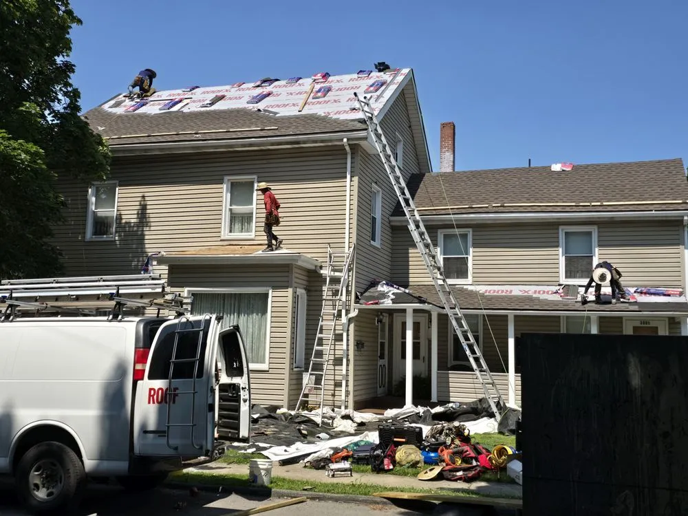 Slide of ROOFX Roofing