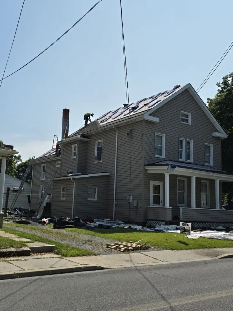 Slide of ROOFX Roofing