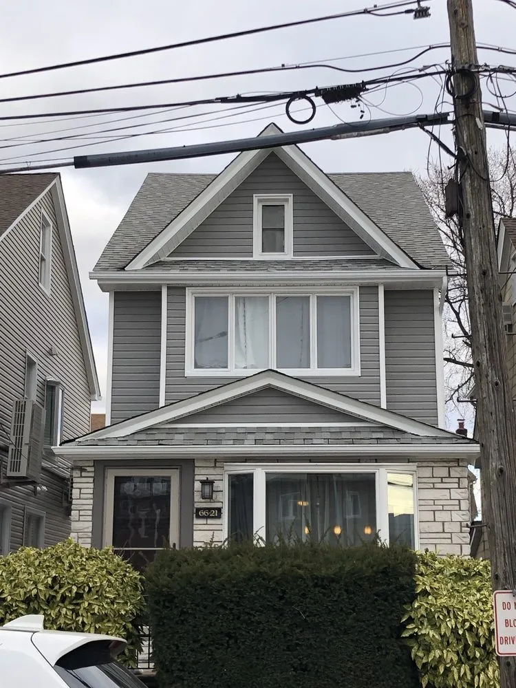 Slide of Roosevelt Roofing & Sheet Metal Works