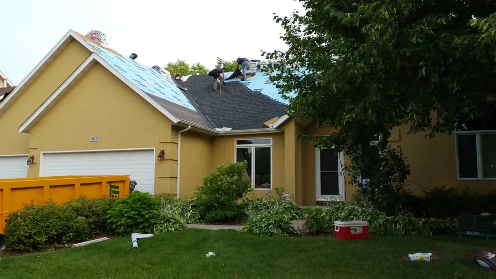 Slide of Rooster Exteriors