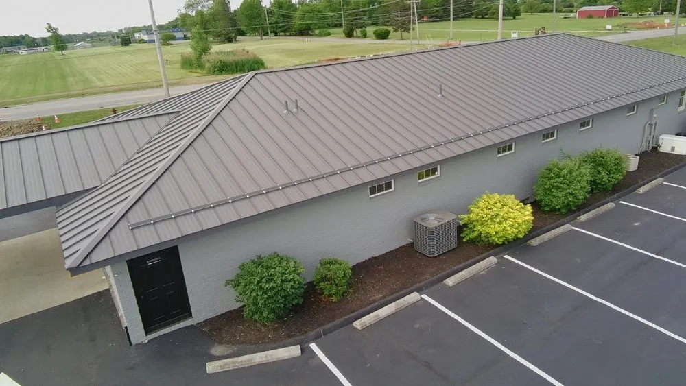 Slide of Rooster Roofing