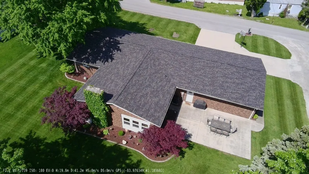 Slide of Rooster Roofing
