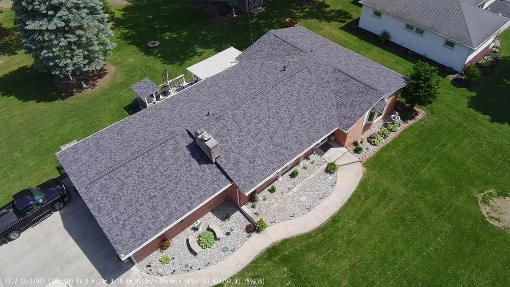 Slide of Rooster Roofing