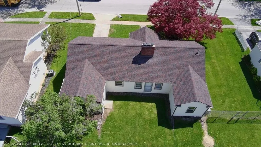 Slide of Rooster Roofing