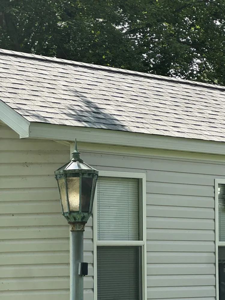 Slide of Rooster Roofing