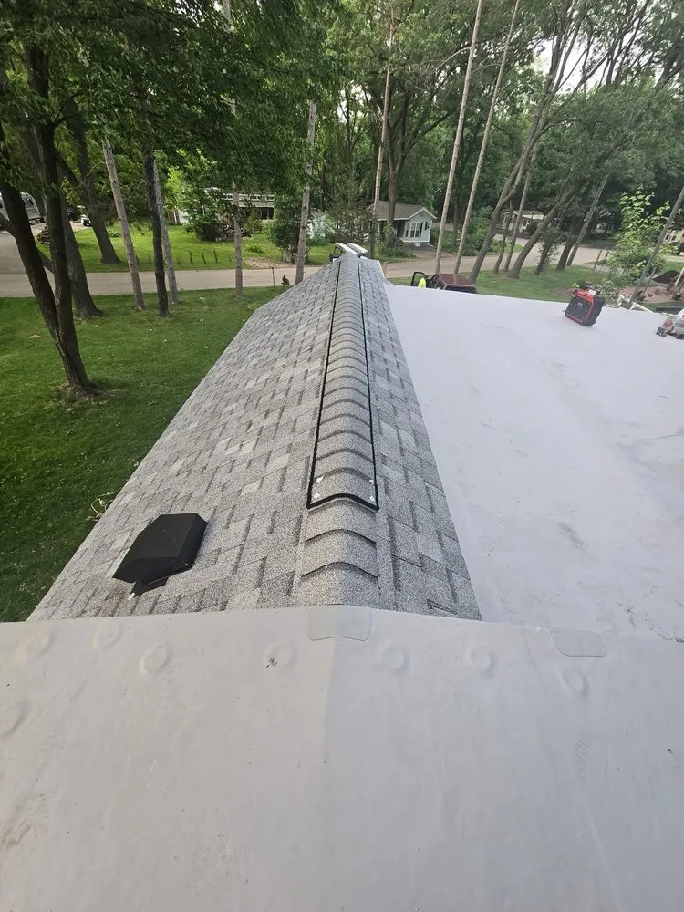 Slide of Rooster Roofing