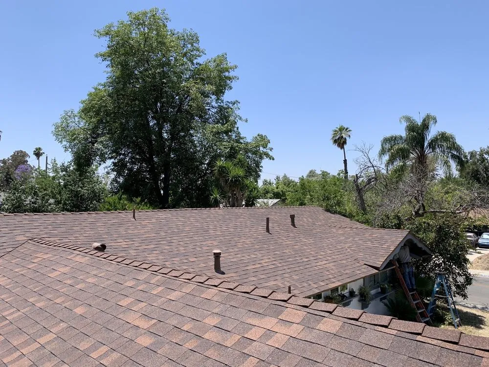 Slide of Rooster Roofing