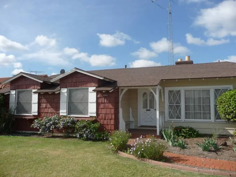 Slide of Rooster Roofing