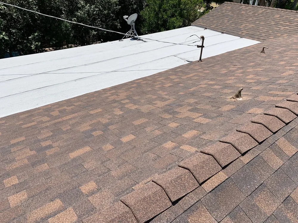 Slide of Rooster Roofing