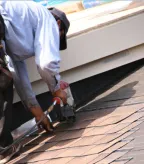 Slide of Roscoe's Roofing Construction