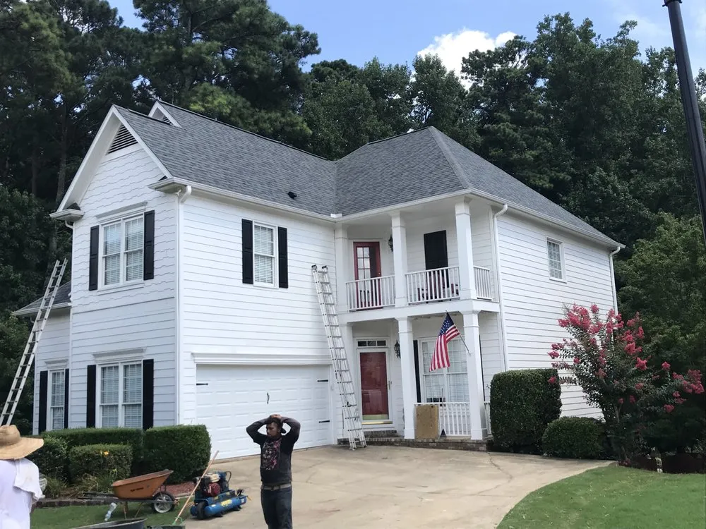 Slide of Rosie's Roofing and Restoration