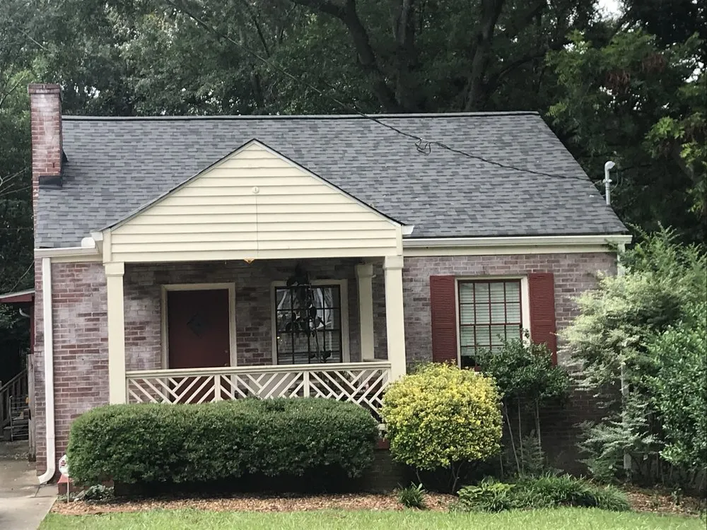 Slide of Rosie's Roofing and Restoration