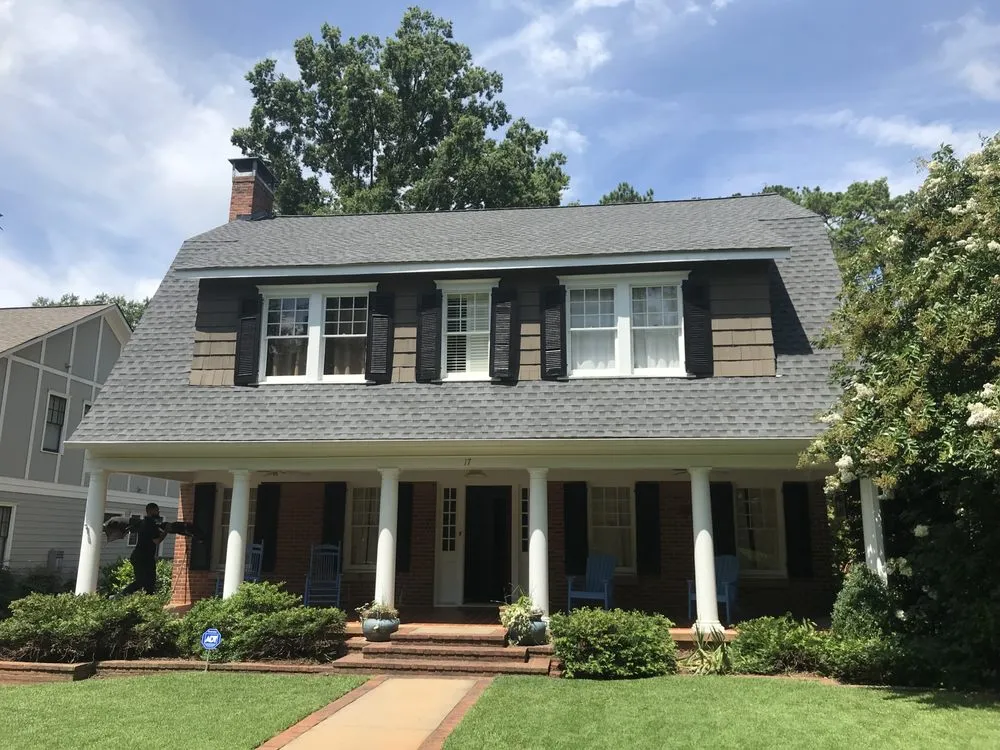 Slide of Rosie's Roofing and Restoration